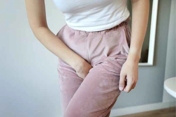 woman struggling with urine incontinence Romsey