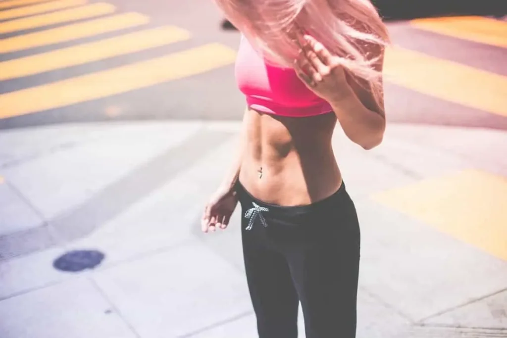 Woman with toned stomach after LA-EMS Body Sculpting Treatment Romsey